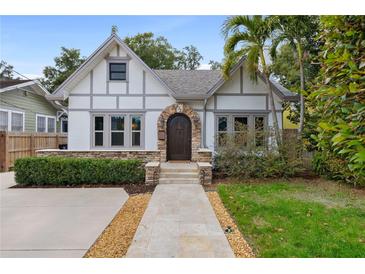 Charming craftsman home with stone accents and landscaped yard at 832 N Summerlin Ave, Orlando, FL 32803