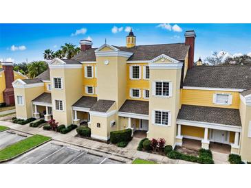 Luxury townhome community boasts elegant architecture and attractive landscaping at 1310 Seven Eagles Ct # 301, Reunion, FL 34747