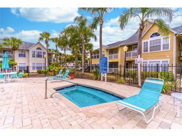 Relaxing spa area with lounge chairs and hot tub at 1057 S Hiawassee Rd # 1911, Orlando, FL 32835