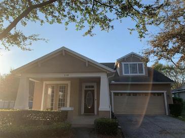 Attractive Craftsman style home with two-car garage at 6344 Earthgold Dr, Windermere, FL 34786