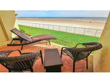 Enjoy breathtaking ocean views from this relaxing patio area at 4153 S Atlantic Ave # 1030, New Smyrna Beach, FL 32169