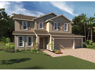 Two-story house with tan siding, brown roof, and a two-car garage at 4170 Gooseberry Trl, Kissimmee, FL 34746
