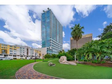 High-rise building with city views and landscaping at 150 E Robinson St # 2512, Orlando, FL 32801