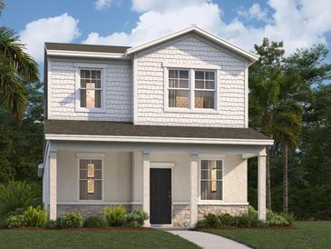 Two-story home with white siding, gray accents, and a stone facade at 442 Belmond Dr, Debary, FL 32713