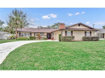 Beautiful ranch home with a large front yard and circular driveway at 2231 Deloraine Trl, Maitland, FL 32751