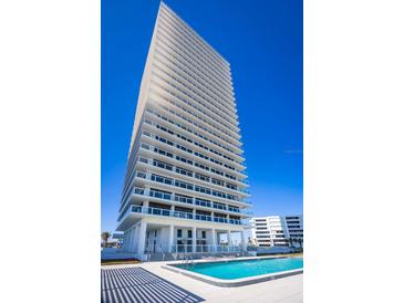 High-rise building with pool and ocean views at 3000 N Atlantic Ave # 17, Daytona Beach, FL 32118