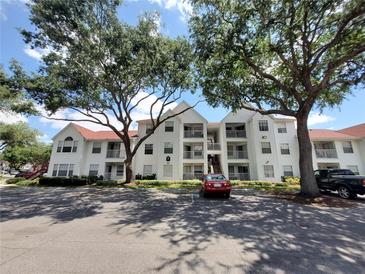 Two-story condo building with ample parking at 11526 Westwood Blvd # 725, Orlando, FL 32821