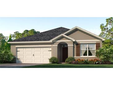 One-story house with a two-car garage and landscaped front yard at 7086 Painted Bunting Way, St Cloud, FL 34773