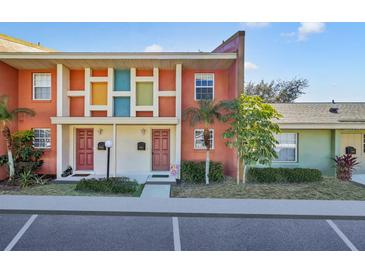 Cute and colorful mid-century condo building with two units at 4952 Tangerine Ave # 4952, Winter Park, FL 32792