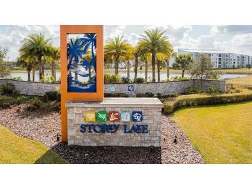Story Lake community entrance sign with lake view at 3151 Paradox Cir # 107, Kissimmee, FL 34746