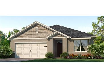 One-story house with light brown siding and a two-car garage at 1723 Three Bars Rd, Kissimmee, FL 34744