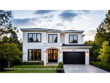 Elegant two-story home featuring a black garage door, black trim, and manicured lawn at 2011 University Dr, Orlando, FL 32804