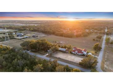 Aerial view showcasing a home and expansive property at 4230 Rex Dr, Winter Garden, FL 34787