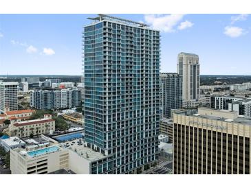 High-rise building with city views and a pool at 150 E Robinson St # 2908, Orlando, FL 32801