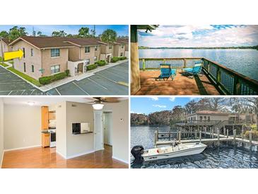 Property overview showcasing kitchen, lake view, and boat dock at 1158 Calle Del Norte # D, Casselberry, FL 32707