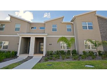 Modern two-story townhome with attractive landscaping at 2952 Protagonist St, Kissimmee, FL 34746