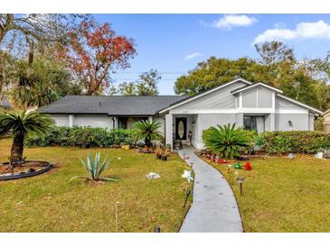 Nice curb appeal! Single story home with well-maintained landscaping at 3717 Jericho Dr, Casselberry, FL 32707