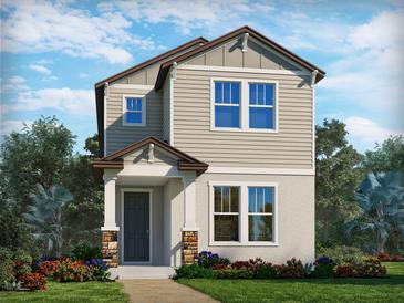 Two-story house with gray siding, brown accents, landscaping, and a walkway at 4642 Homestead Trl, St Cloud, FL 34772