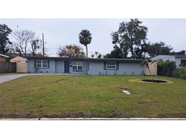 Newly renovated single story home with landscaped lawn at 4220 Lancashire Ln, Orlando, FL 32812