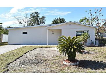 Newly renovated single story home with a paved driveway and landscaped yard at 660 Encino Way, Altamonte Springs, FL 32714