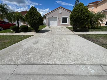 Large driveway with enough space for multiple vehicles at 2317 Santa Lucia St, Kissimmee, FL 34743