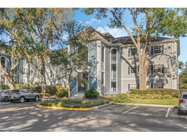 Two-story condo building with ample parking and landscaping at 4302 Clubside Dr # 4302, Longwood, FL 32779