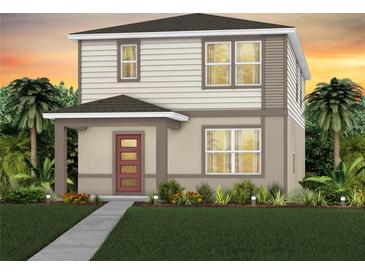 Two-story home with light-colored siding, red door, and landscaping at 6505 Breeze Filled Ln, Winter Garden, FL 34787