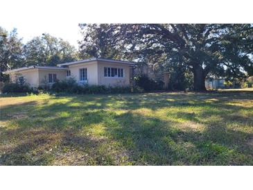 Ranch-style home with large yard at 1425 N Hiawassee Rd, Orlando, FL 32818