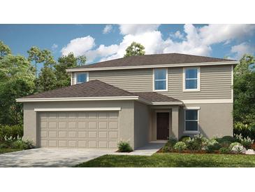 Two-story house with a neutral color scheme and a two-car garage at 4640 Yellow Elder Way, Kissimmee, FL 34758