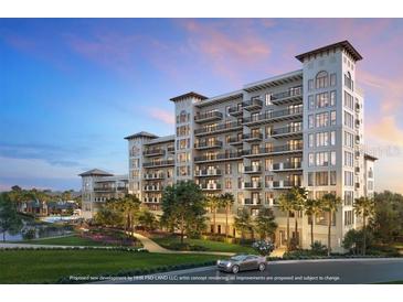 Stunning exterior view of the multi-story residence with private balconies, lush landscaping and serene water feature at 10601 Autumn Mist Ln # 302, Golden Oak, FL 32836