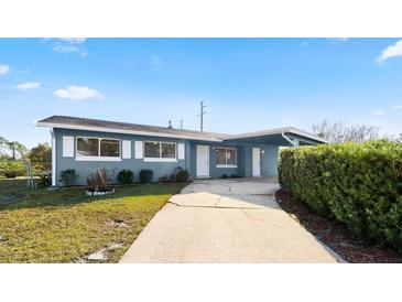 Charming ranch home with updated facade and landscaped yard at 1609 Stocking St, Daytona Beach, FL 32117