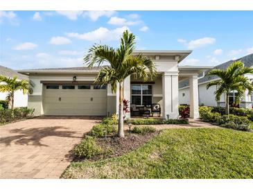 One-story home with a two-car garage and landscaped yard at 2777 Southland St, St Cloud, FL 34772