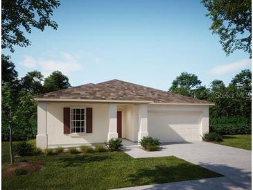 One-story home with a two-car garage and a landscaped front yard at 1655 Andover Ridge Dr, Deland, FL 32720