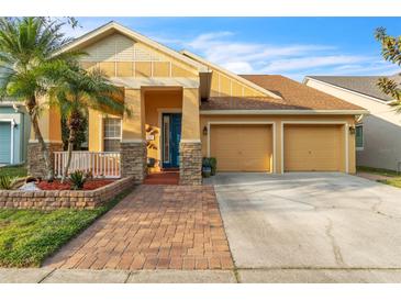 Inviting single-Gathering home with a two-car garage, lovely landscaping, and a charming entryway at 4912 Atwood Dr, Orlando, FL 32828