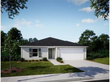 New single-story house with a two-car garage and landscaped lawn at 1420 Trinidad St, Deland, FL 32720