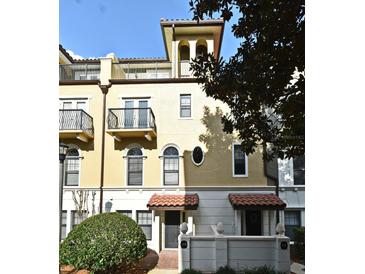 Inviting 3 story townhome with a charming front porch at 4220 Messina Dr, Lake Mary, FL 32746
