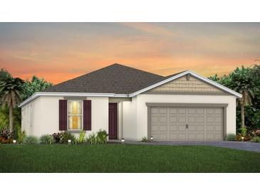 One-story home with two-car garage, neutral siding, and landscaping at 2705 Serenity Meadow Dr, Kissimmee, FL 34744
