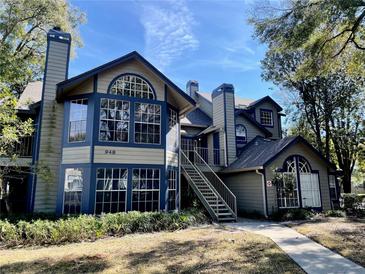 Beautiful two-story home with charming architectural details and inviting front entrance at 948 Bird Bay Ct # 206, Lake Mary, FL 32746