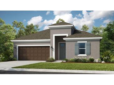 Charming single-story home showcasing a neutral color scheme, well-maintained lawn, and attached two car garage at 4698 Coral Harbour Rd, Kissimmee, FL 34758