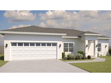 Charming single-story home with a two-car garage, landscaped yard, and a welcoming front entrance at 13449 Sw 60Th Avenue Rd, Ocala, FL 34473
