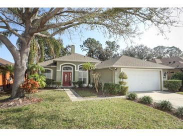 Charming single-story home with lush front yard and attached two-car garage at 500 Pickfair Ter, Lake Mary, FL 32746