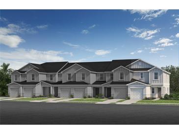 Charming new townhomes feature eye-catching architectural details and attached garages at 366 Sequoia Dr, Lake Wales, FL 33859