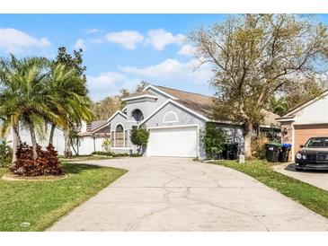 Inviting single story home with a two car garage and long driveway at 2957 Birmingham Blvd, Orlando, FL 32829