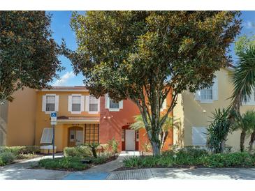 Exterior of home showcasing lush landscaping and architectural details at 8523 Crystal Cove Loop, Kissimmee, FL 34747