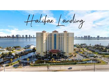 Halifax Landing building boasts an impressive design, lush landscaping, parking, and waterfront views at 2801 S Ridgewood Ave # 1412, South Daytona, FL 32119