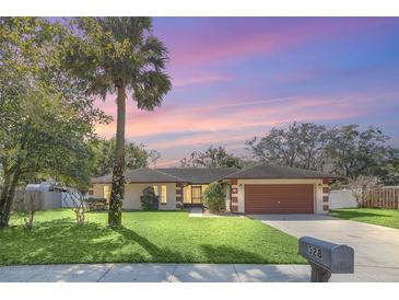 Charming single-story home featuring a well-manicured lawn and inviting curb appeal at 328 Bridle Path, Casselberry, FL 32707