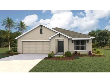 Charming single-story home with a two-car garage, simple landscaping and a neatly manicured lawn at 6989 Sw 135Th Pl, Ocala, FL 34473