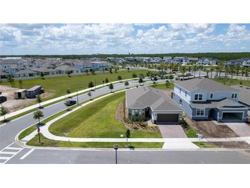 Beautiful single-Gathering home with brick driveway and manicured lawn in a Primary-planned community at 13270 Panama Beach Ct, Orlando, FL 32827