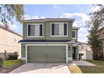 Charming two-story home with a spacious two car garage and beautiful curb appeal at 15318 Beamleigh Rd, Winter Garden, FL 34787