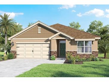 Charming single-story home featuring a two-car garage, neutral stucco, stone accents, and lush landscaping at 33491 Copper Hill Way, Sorrento, FL 32776